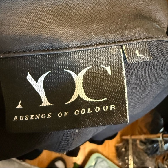 Black Asymmetrical Wrap Dress with Notched Collar - Picture 6 of 8